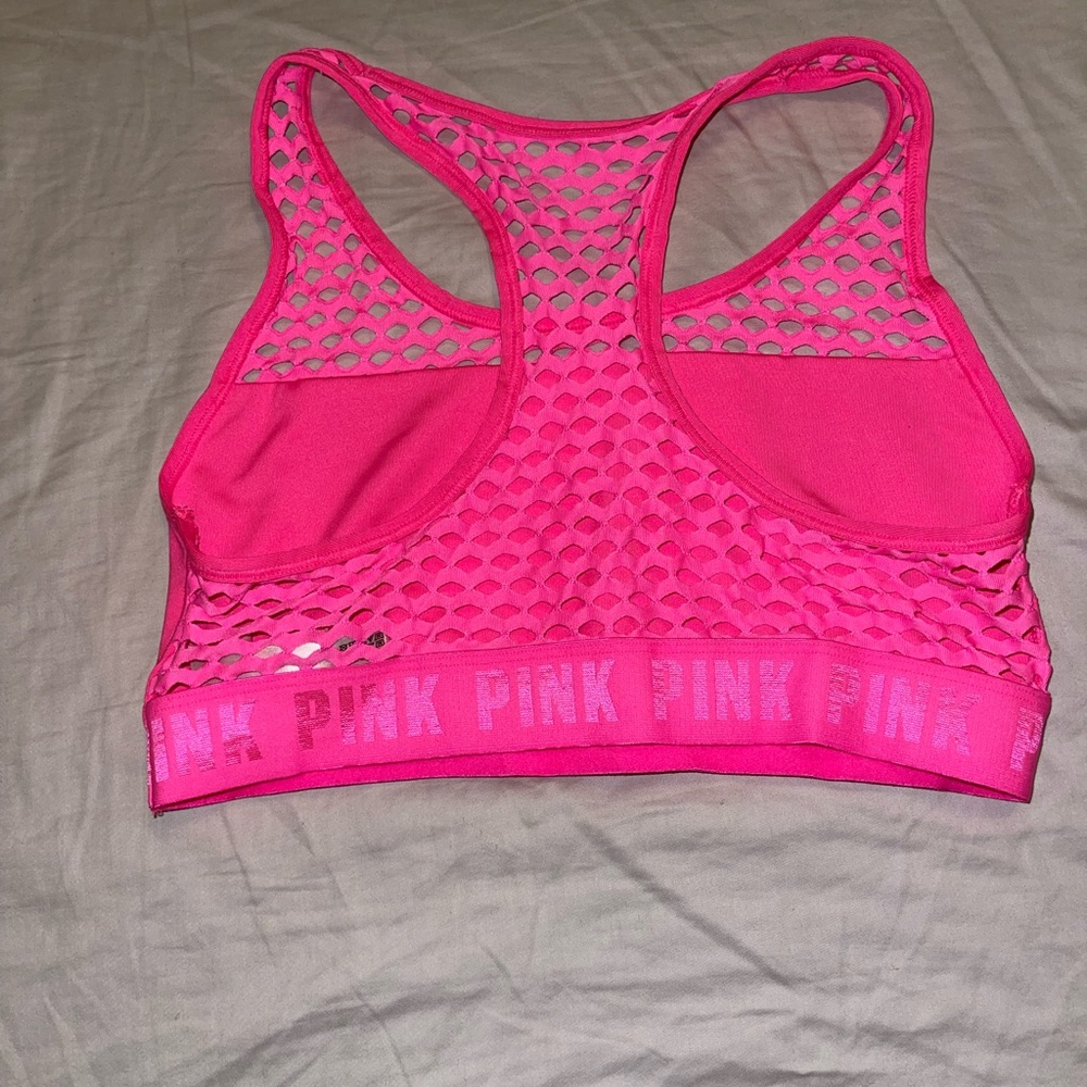 Pink  sports bra size Large never used great condition
